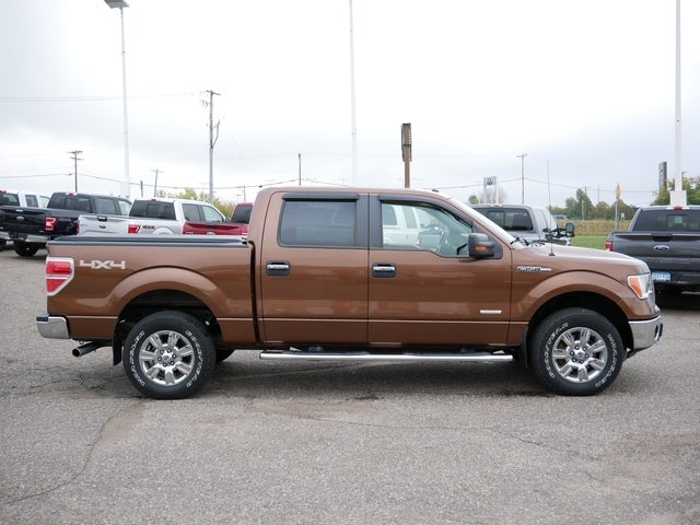 Used 2011 Ford F-150 XLT with VIN 1FTFW1ET4BFC77140 for sale in Inver Grove, Minnesota