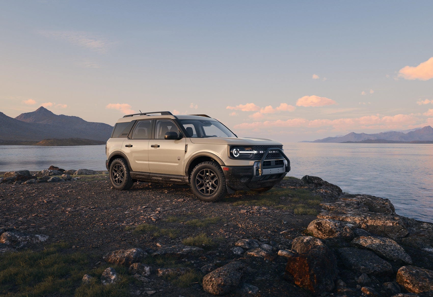 Ford Bronco Sport parked on cliff overlooking the water