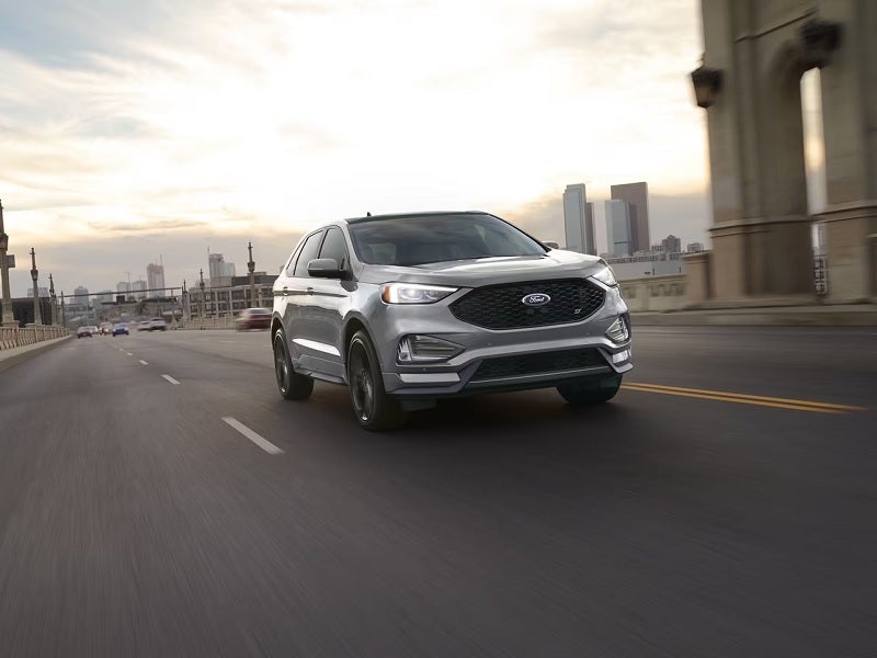 Ford Edge driving on city road with motion blur